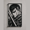 Cuadro de acero de Guts de Berserk con la Dragonslayer colgado en pared