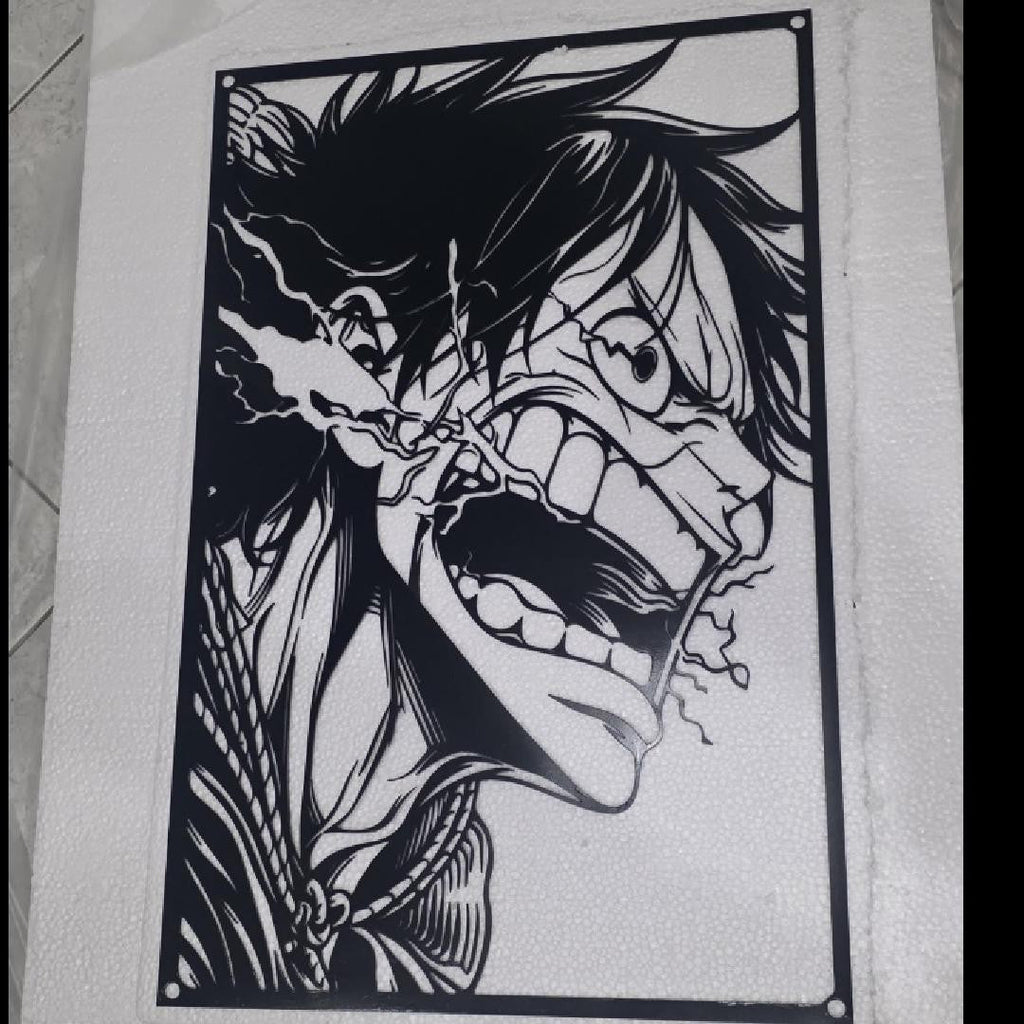 Corte láser y pieza terminada del cuadro de Luffy en acero, colgado en pared