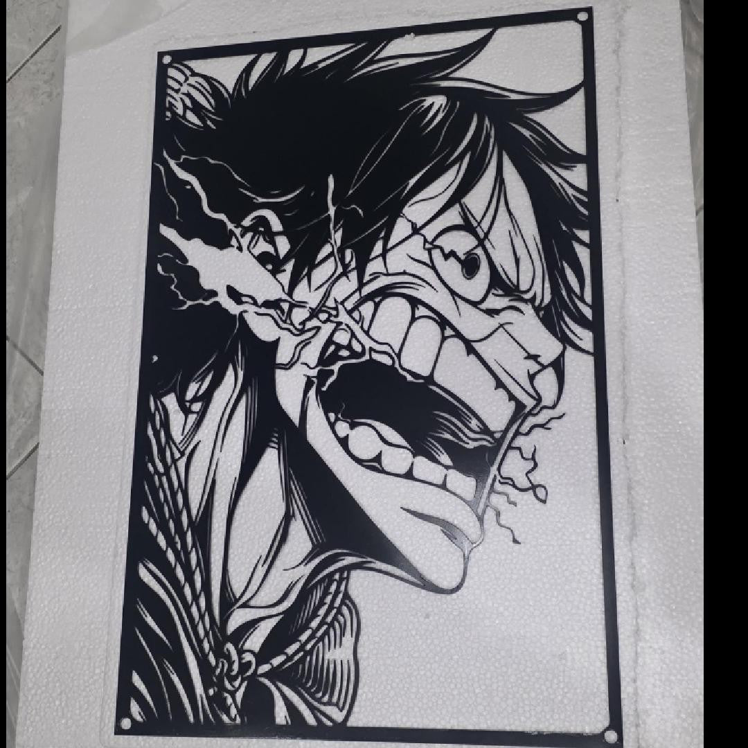 Corte láser y pieza terminada del cuadro de Luffy en acero, colgado en pared